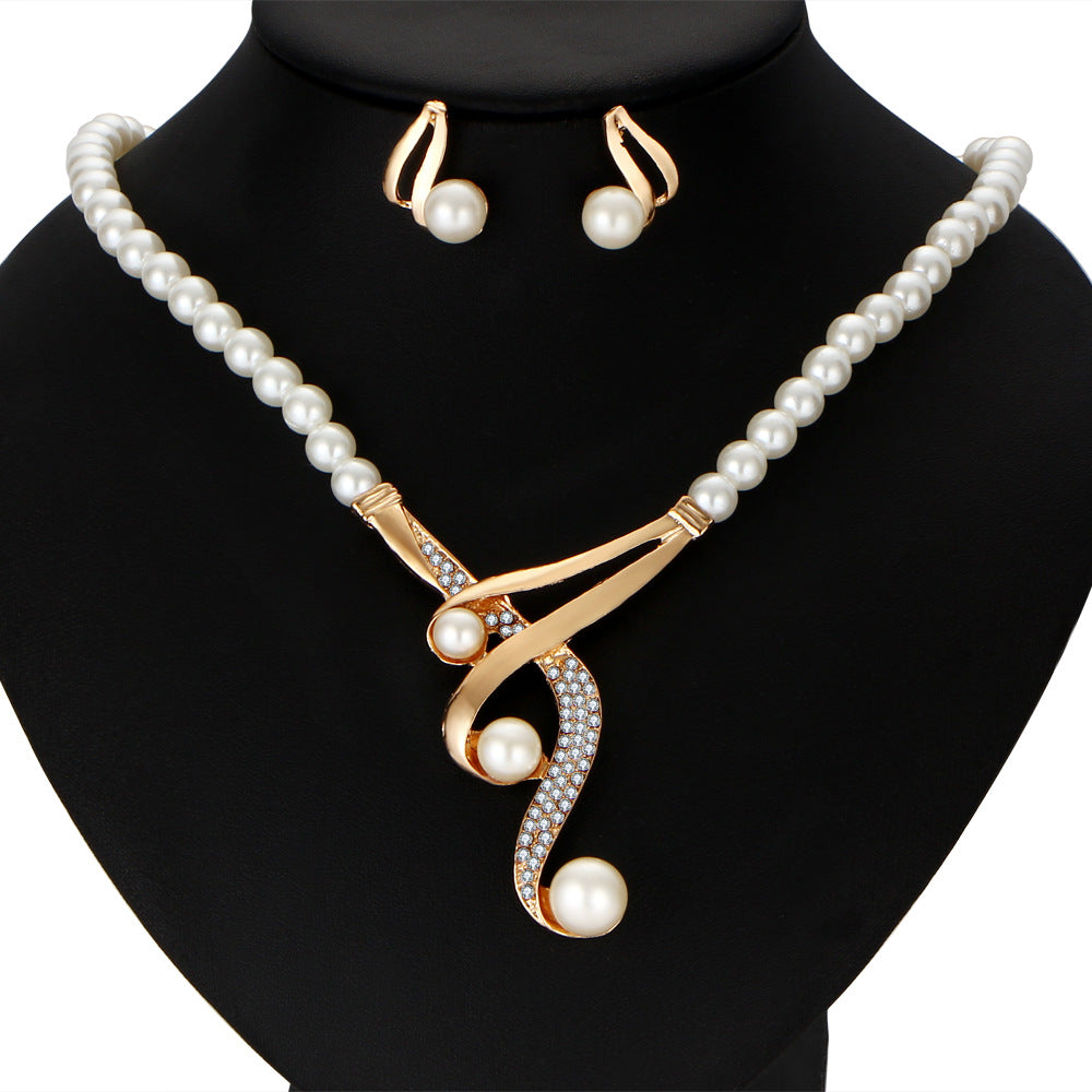 SparkShift Elegant Pearl Gold Jewelry Set