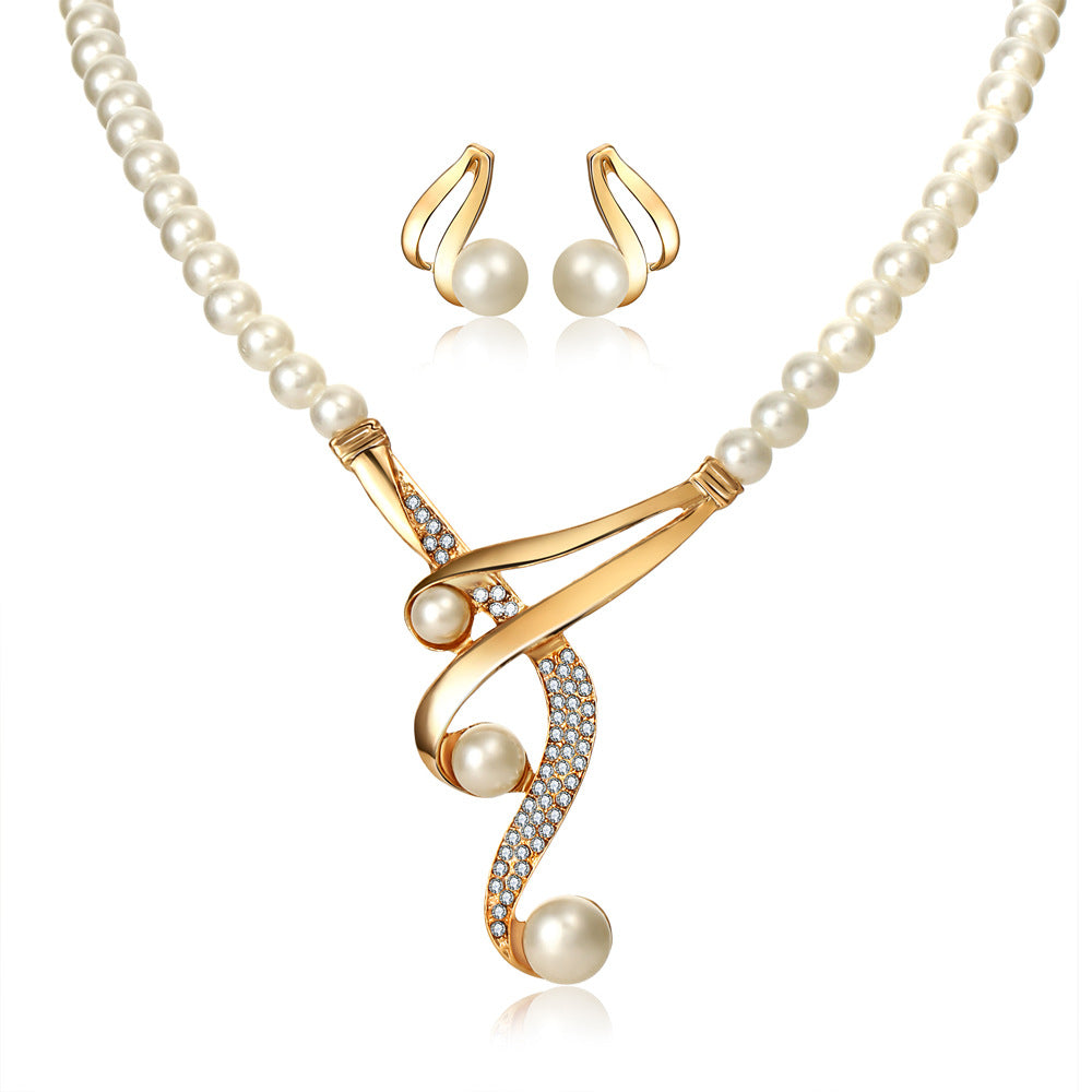 SparkShift Elegant Pearl Gold Jewelry Set
