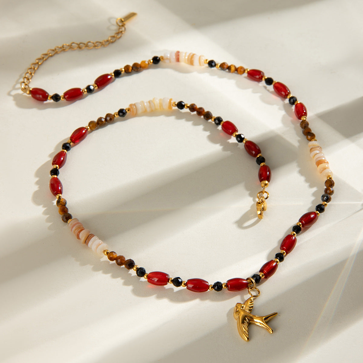 SparkShift Apex Tiger Eye Beaded Necklace with Bird Pendant